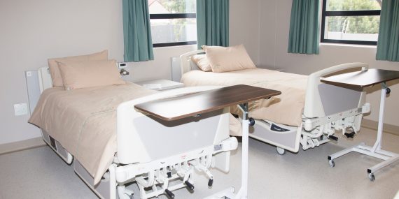 A hospital room awaiting patients