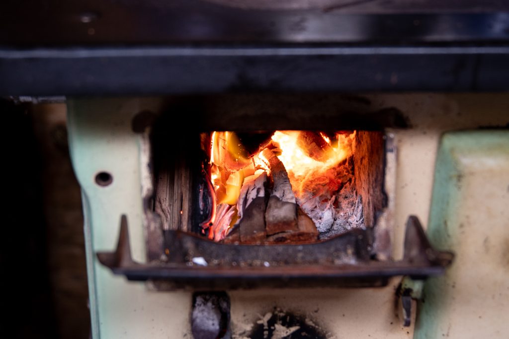 Burning wood on furnace