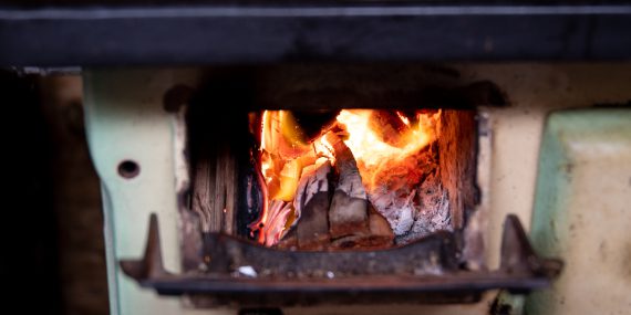 Burning wood on furnace