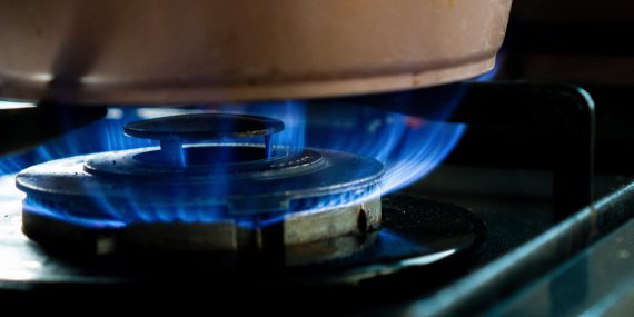 fire on a gas stove for cooking in the kitchen