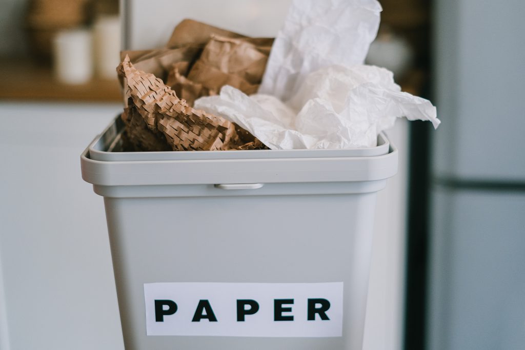 Plastic container for recycling paper in kitchen