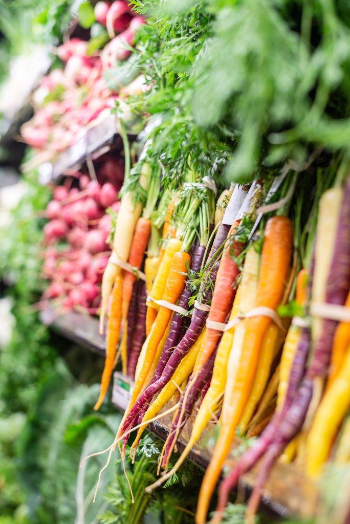 Multicolor organic carrots at the grocery