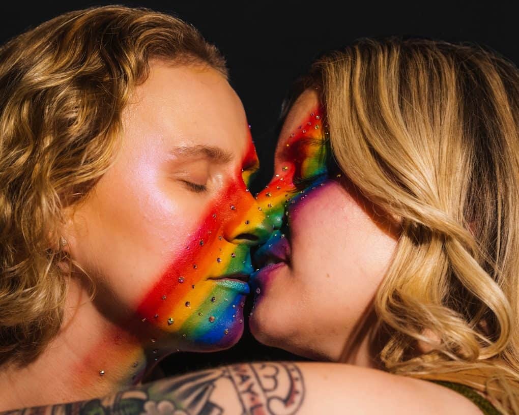 a couple of people that are kissing each other