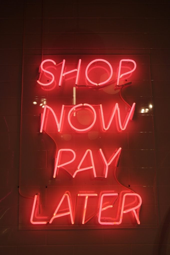 shop now pay later neon signage